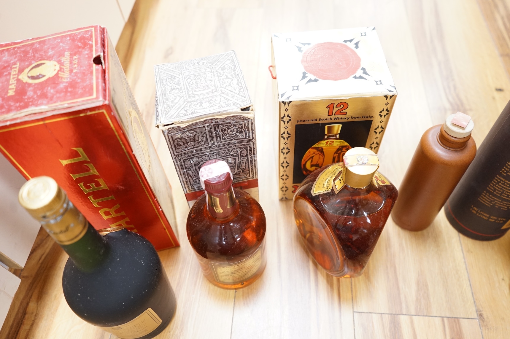 A bottle of Glenmorangie Scotch whisky and five other cased spirits